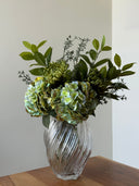 <h2>The Vase Makes the Arrangement</h2>